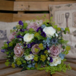 Pink and white rose arrangement supplied by Creative Floral Designs