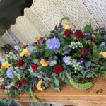 Hydrangea, rose and cala lily coffin spray by Creative Floral Designs